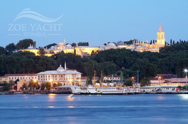 Photo of Topkapi Palace at night as seen from the water