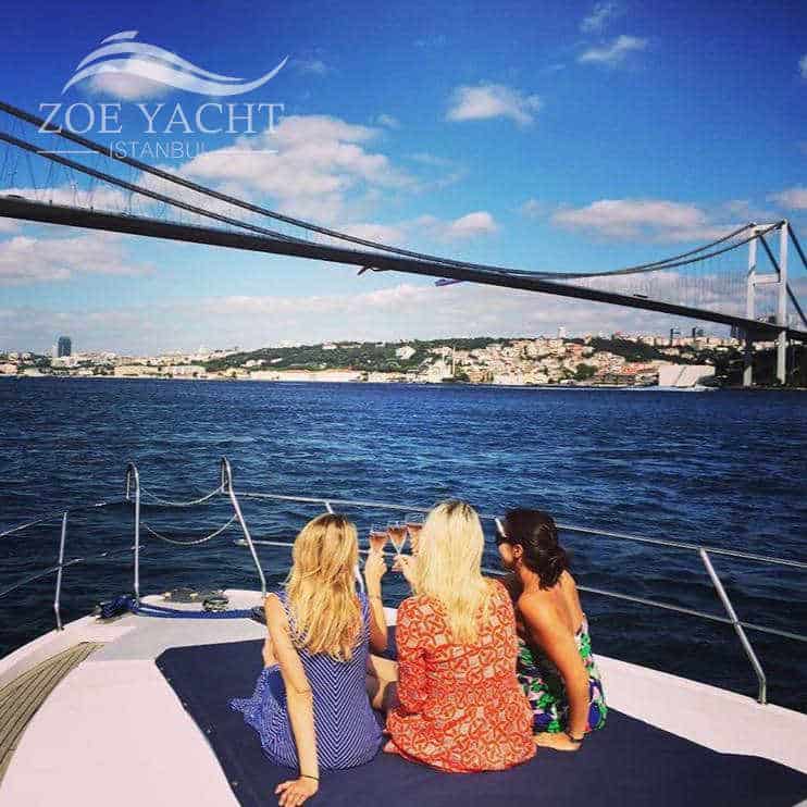 girls sunbathing on the front of zoe yacht istanbul